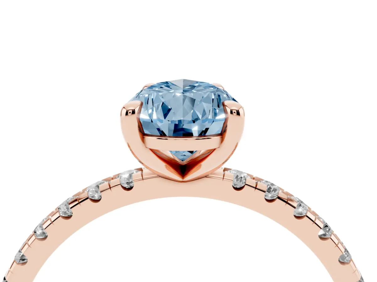 Fancy Blue Pear Cut Diamond Brilliant Solitaire Ring with Pavé Band and Four-Prong Setting Rose gold