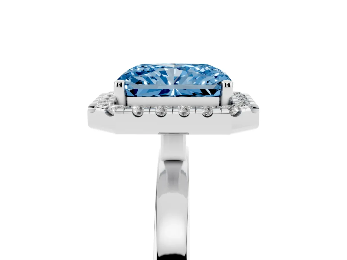 Fancy Blue Radiant Cut Halo Diamond Solitaire with Pavé Band and Four-Prong Setting White gold