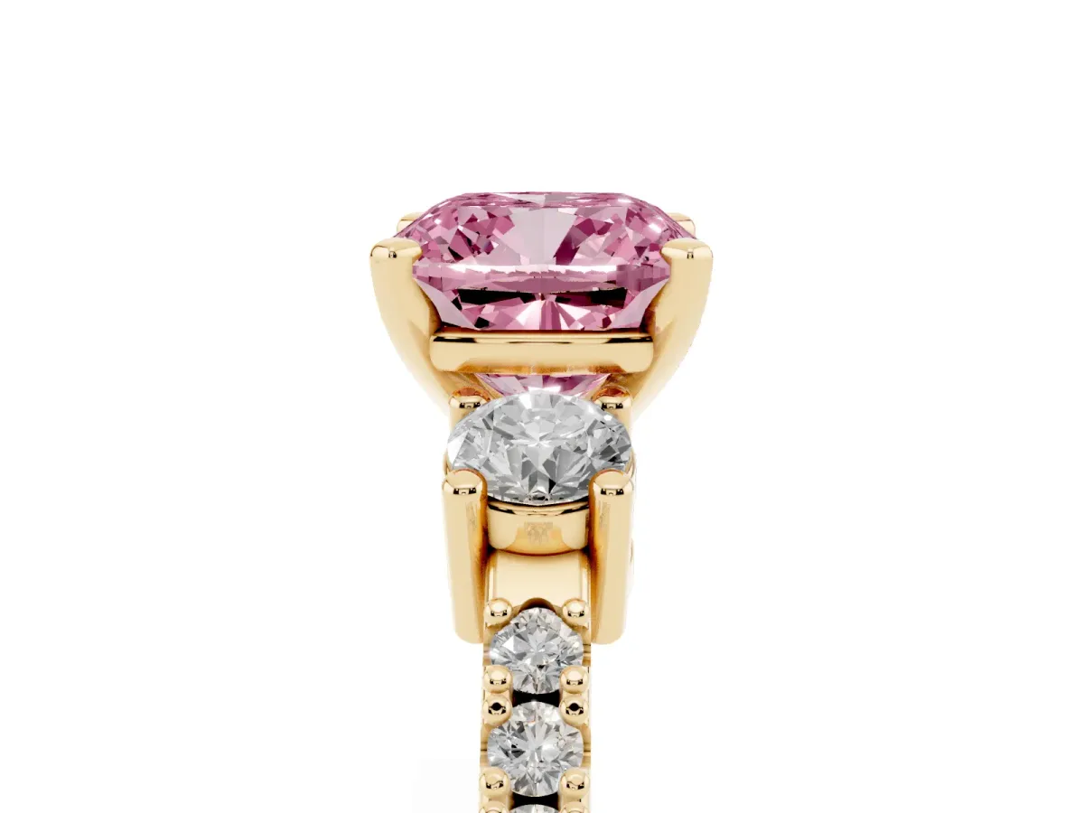Fancy Pink Cushion Cut Three-Stone Diamond Pavé Band with Prong Setting Yellow gold