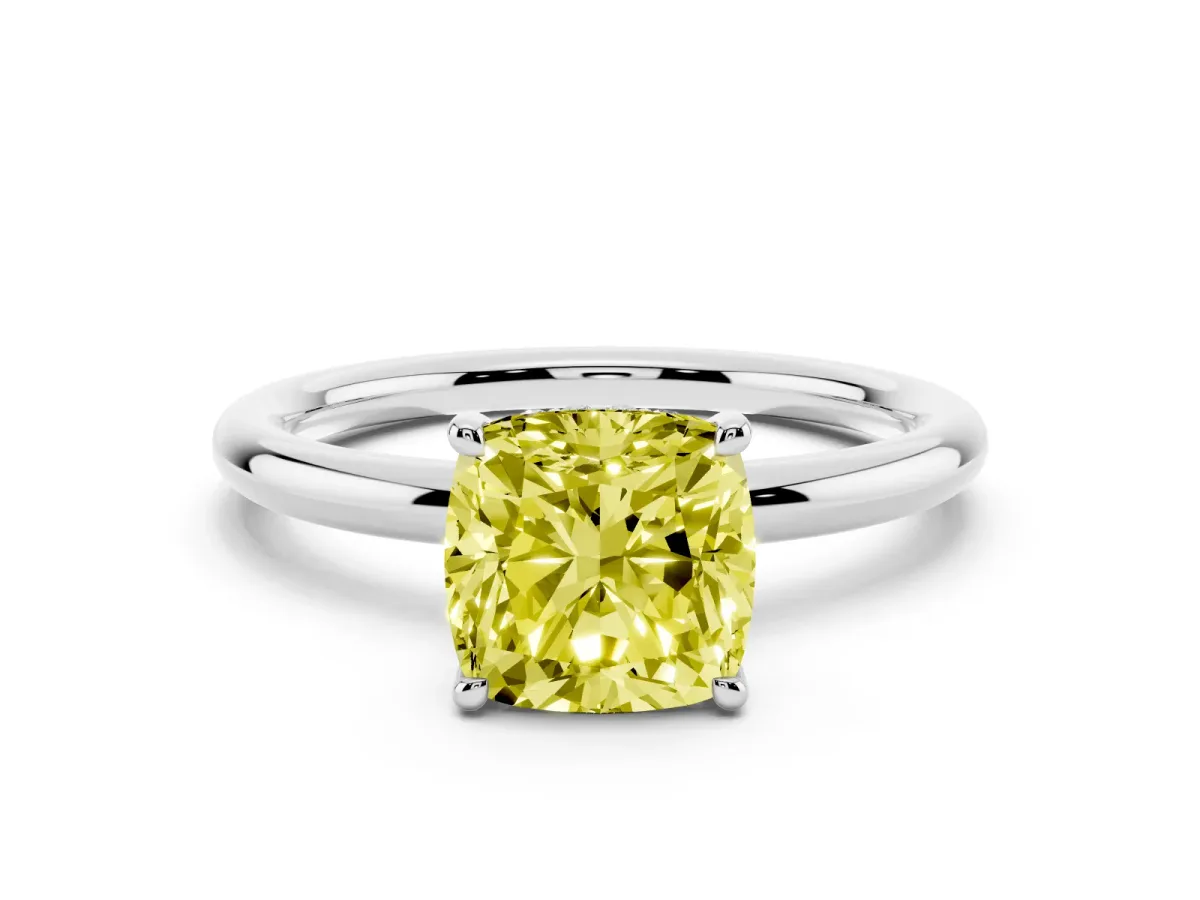 Fancy Yellow Cushion Cut Diamond Solitaire Ring with Thin Band and Four-Prong Setting Silver