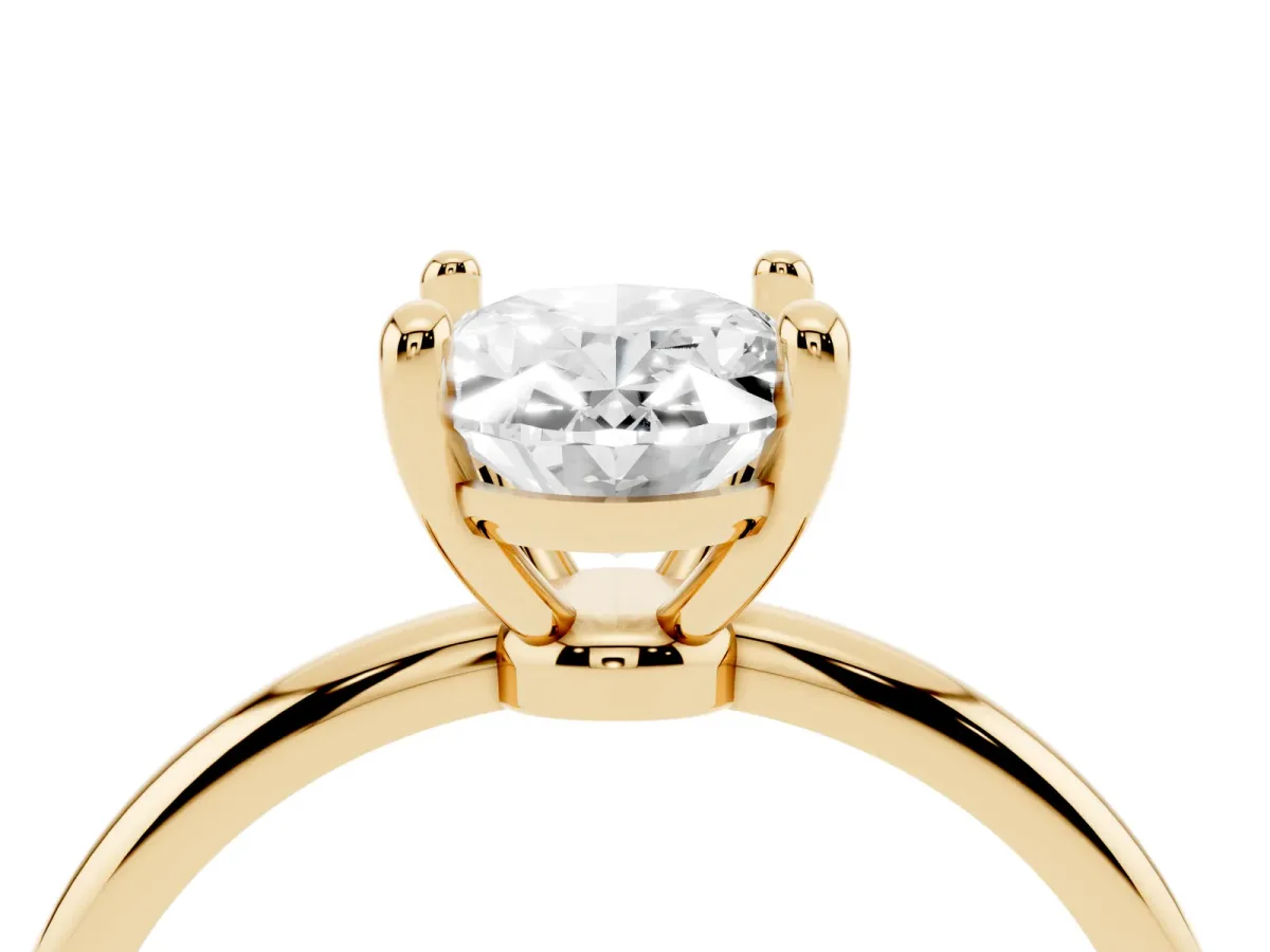 Oval Cut Solitaire Diamond Ring with 4-Prong Setting on a Classic Band Yellow gold