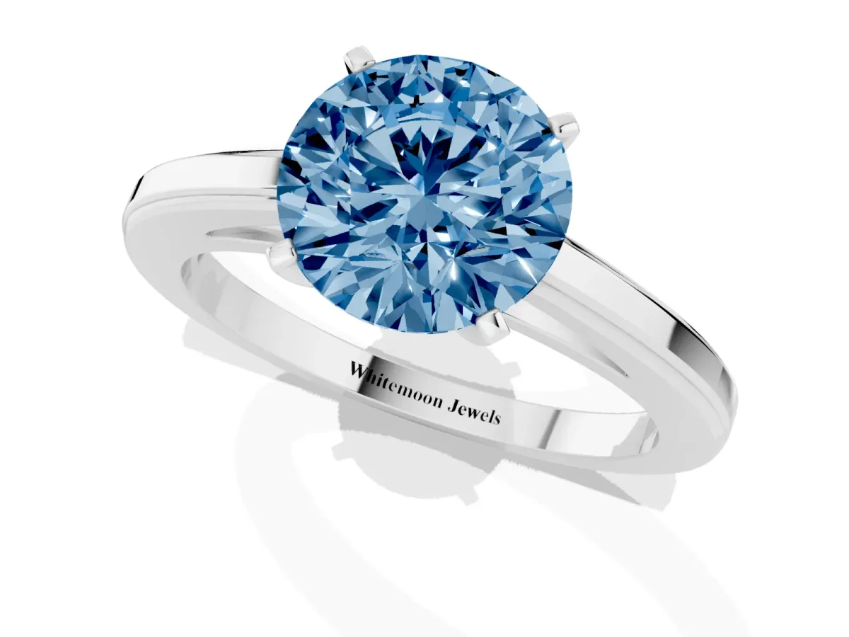 Fancy Blue Round Cut Solitaire Diamond Ring with Four-Prong Setting and Classic Band White gold
