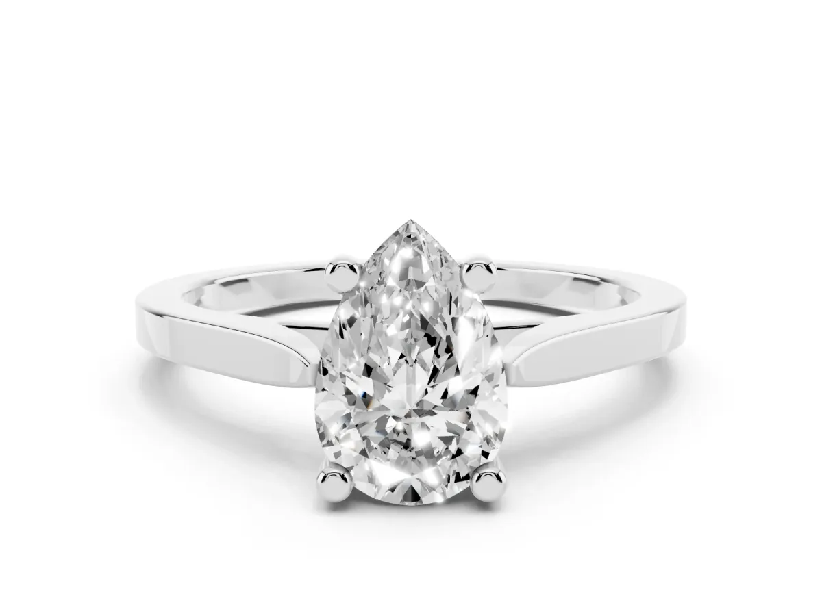 Pear Cut Solitaire Diamond Ring with Four-Prong Setting and Tapered Band Platinum