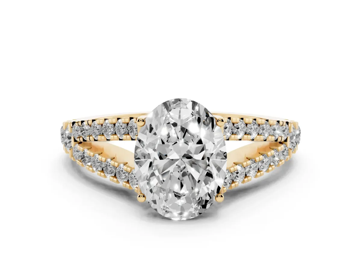 Oval Cut Diamond Split Shank Pavé Engagement Ring with Four-Prong Setting Yellow gold