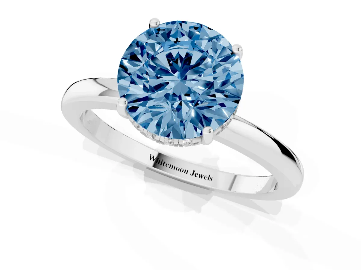Fancy Blue Round Cut Solitaire Diamond Ring with Prong Setting and Plain Band Platinum