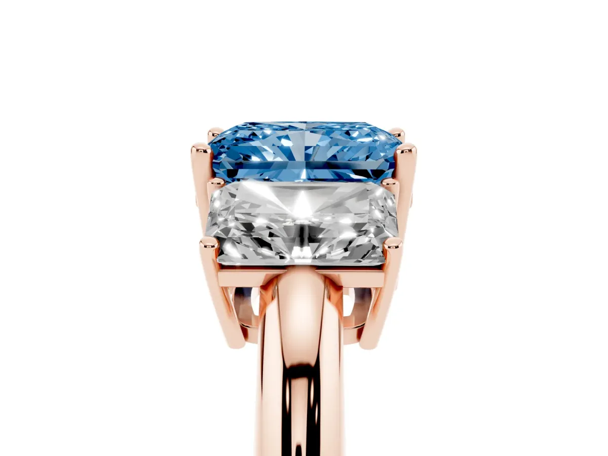 Fancy Blue Three-Stone Radiant Cut Cut Diamond Engagement Ring with Prong Setting on a White Gold Band Rose gold