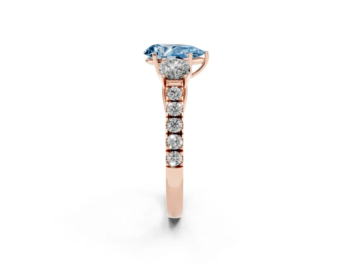 Fancy Blue Pear Cut Cut Diamond Three-Stone Ring with Round Side Stones and Pavé Band Rose gold