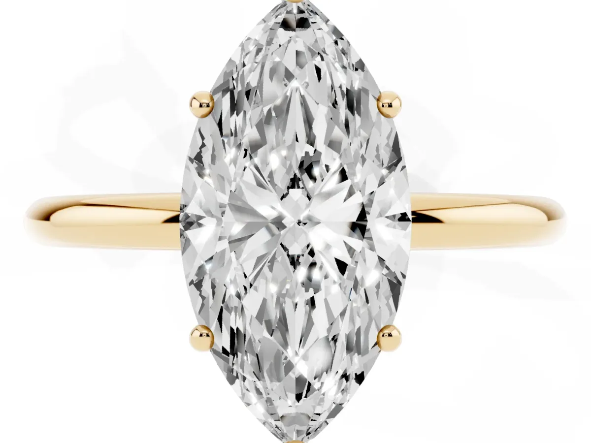 Marquise Cut Solitaire Diamond Ring with a Classic Band and Four-Prong Setting Yellow gold