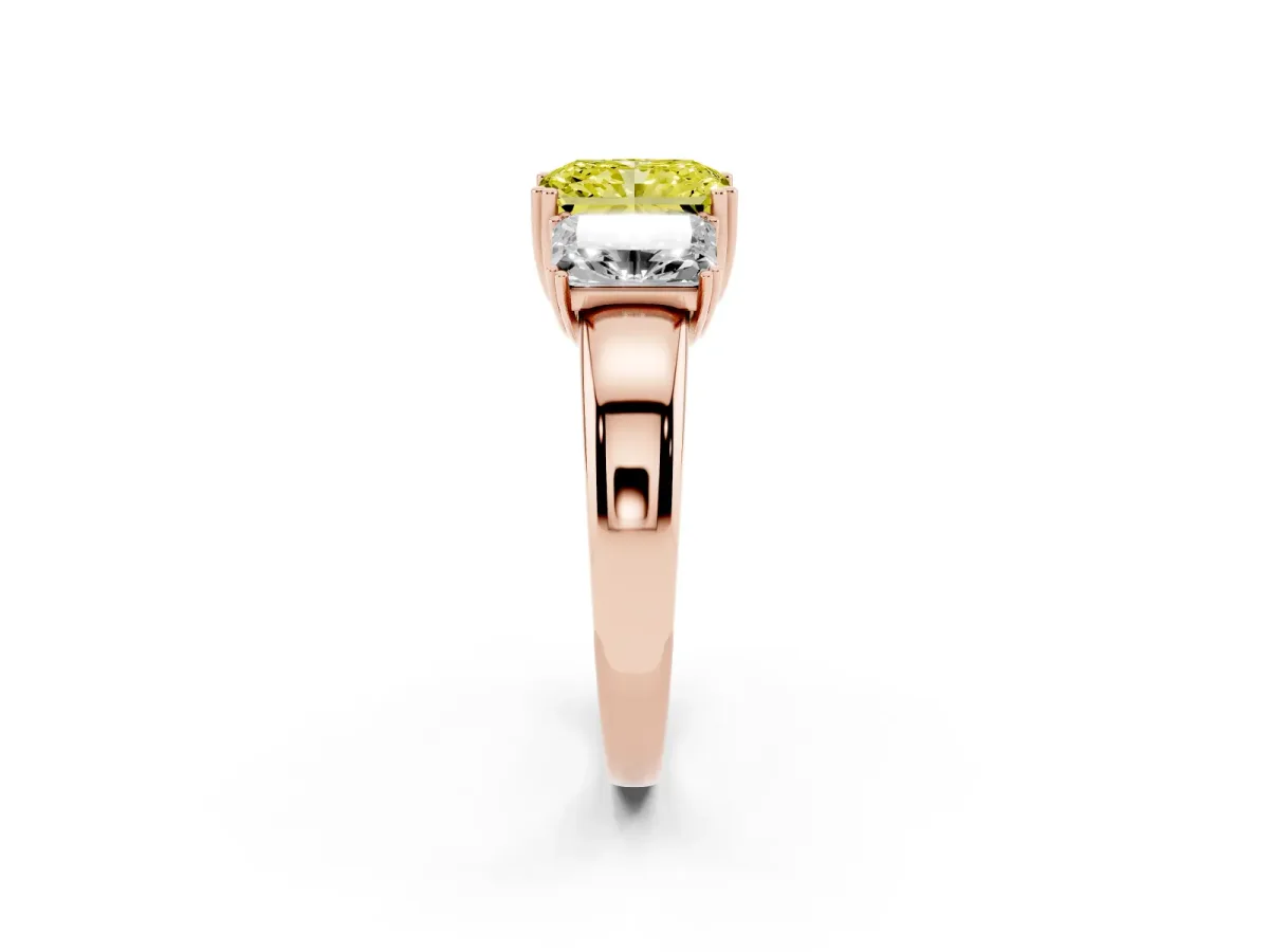 Fancy Yellow Three-Stone Radiant Cut Cut Diamond Ring with Channel Set Band and Four-Prong Setting Rose gold