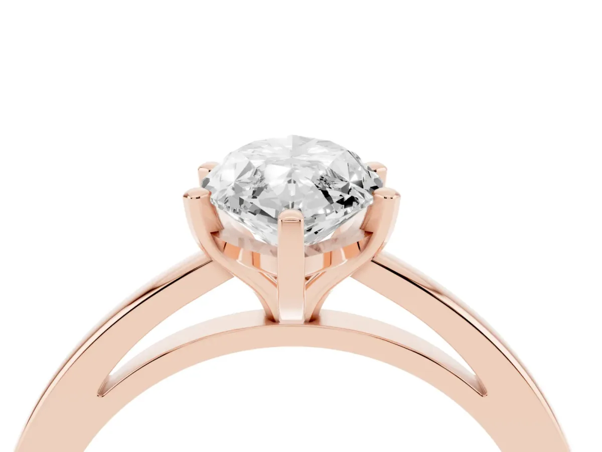 Marquise Cut Solitaire Diamond Engagement Ring with Four-Prong Setting on a Classic Band Rose gold