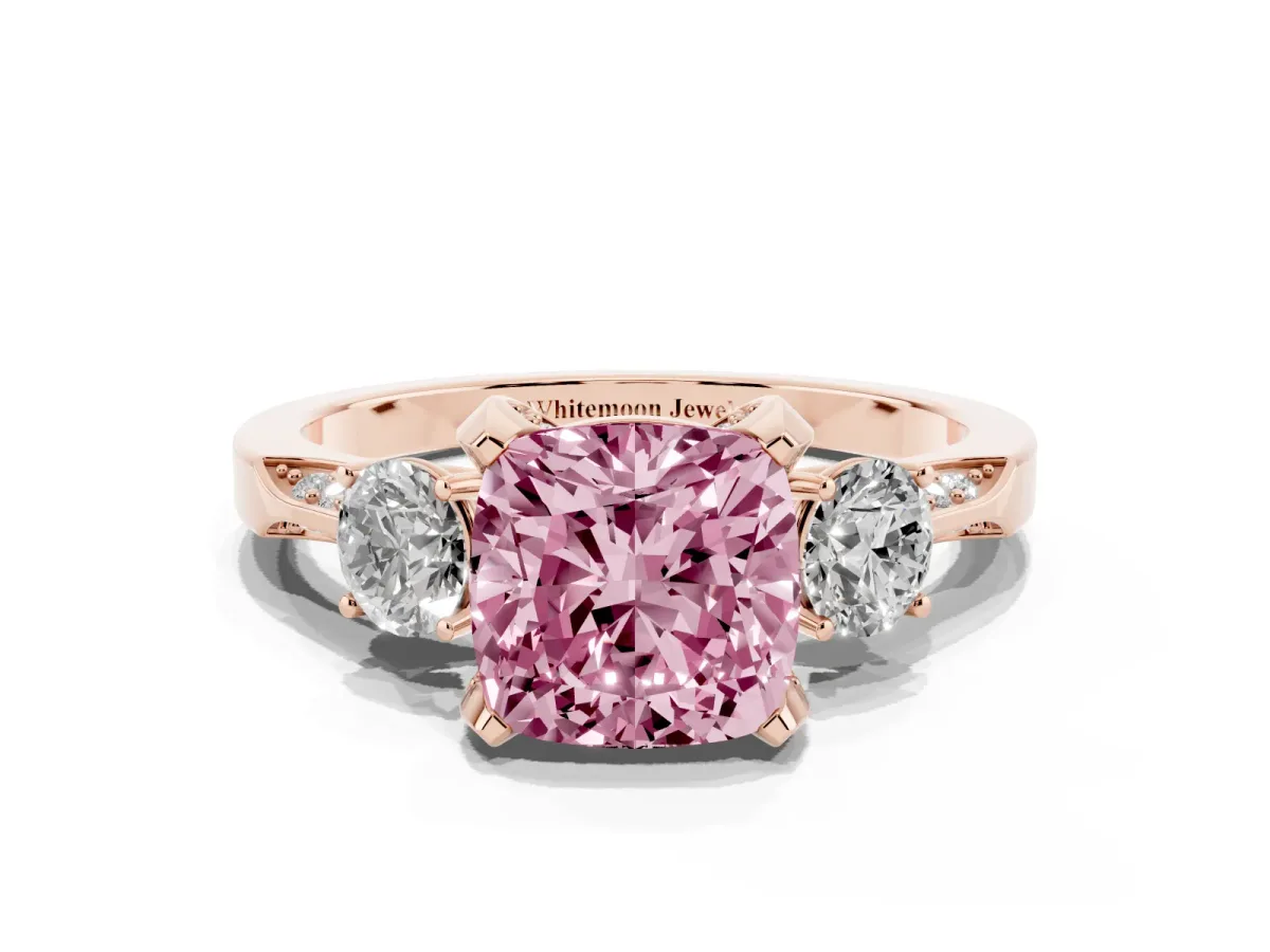 Fancy Pink Cushion Cut Brilliant Three-Stone Diamond Ring with Pavé Band and Four-Prong Setting Rose gold
