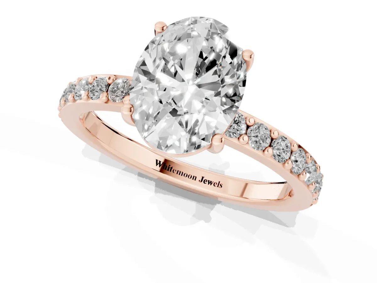 Oval Cut Cut Diamond Solitaire with Pave Band and Four-Prong Setting Rose gold