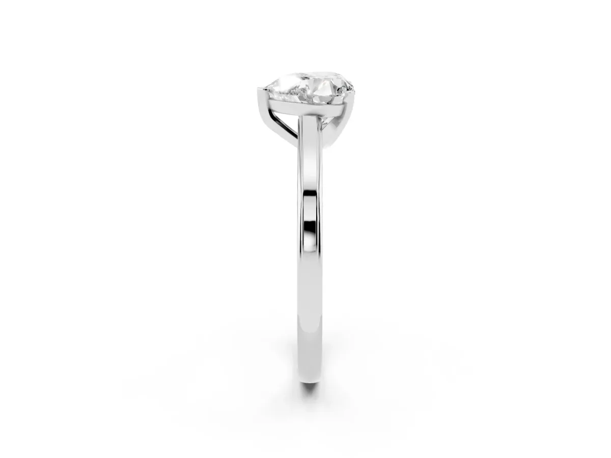 Heart Cut Solitaire Diamond Ring with Four-Prong Setting and Classic Band Silver