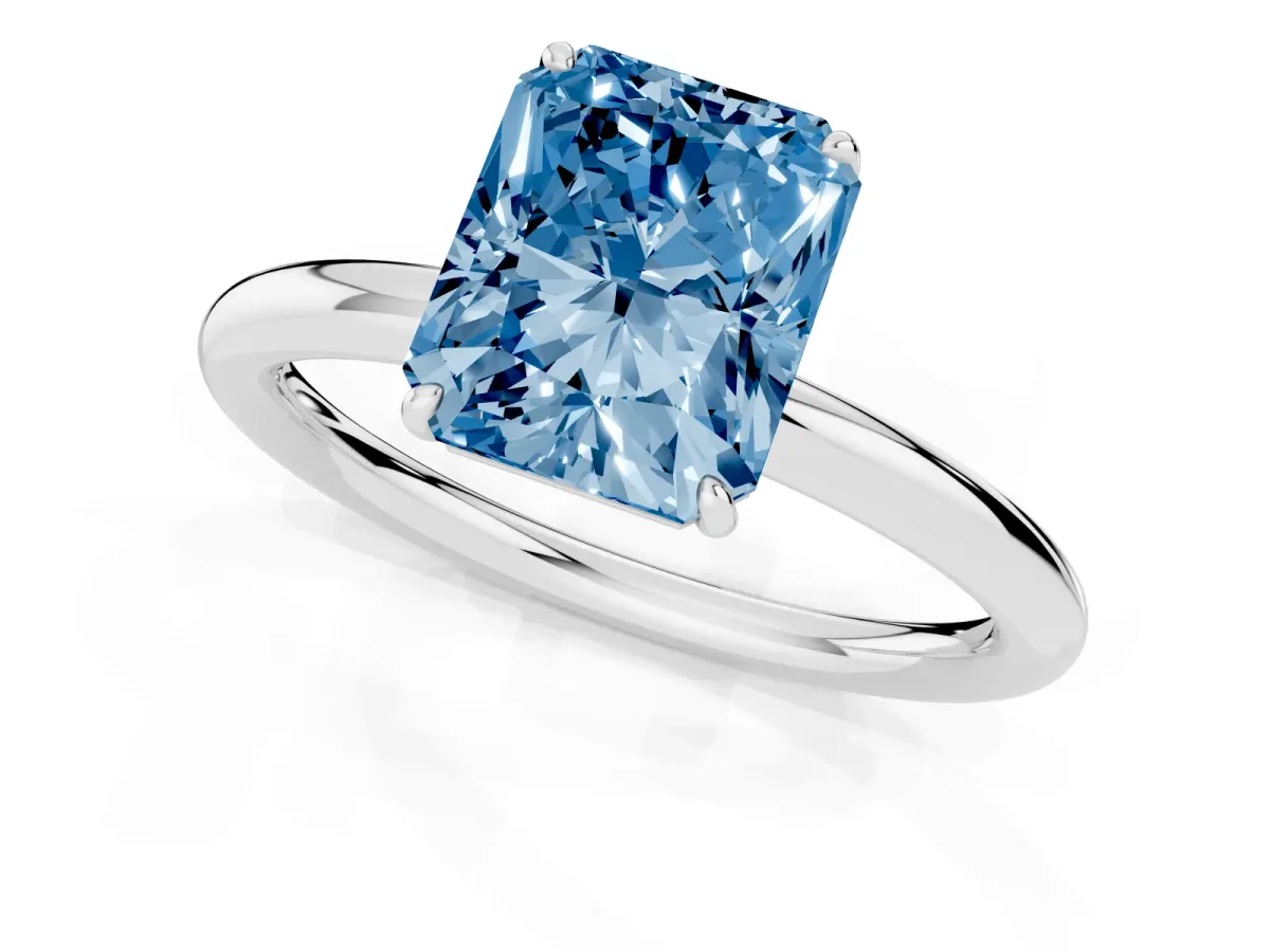 Fancy Blue Radiant Cut Solitaire Diamond Ring with Four-Prong Setting on a Plain Band White gold