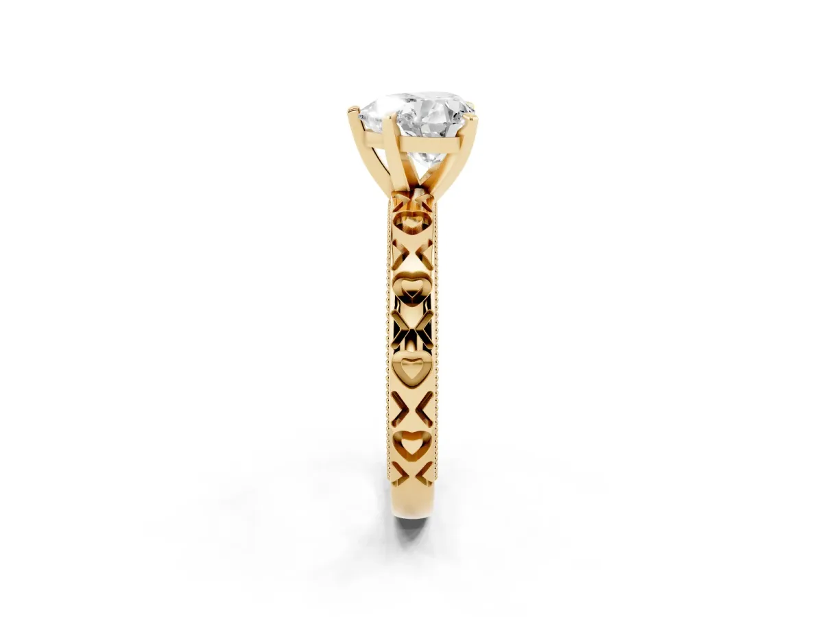 Heart Cut Solitaire Diamond Engagement Ring with XO Engraved Band and Four-Prong Setting Yellow gold