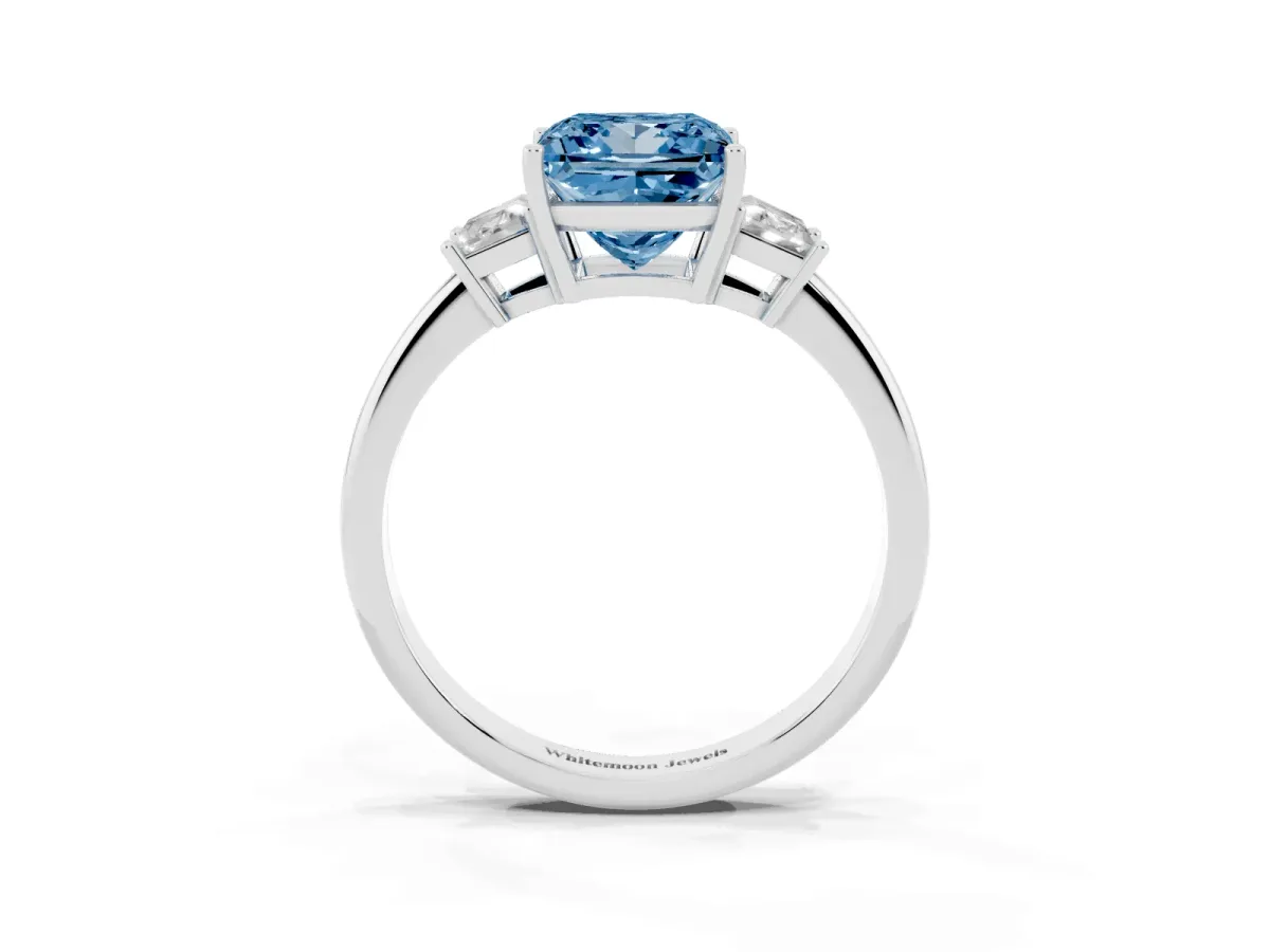Fancy Blue Princess Cut Diamond Three-Stone Ring with Trapezoid Side Stones and Prong Setting Silver