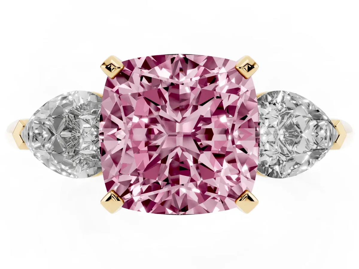 Fancy Pink Three-Stone Cushion Cut Diamond Ring with Pear Side Stones and Four-Prong Setting Yellow gold