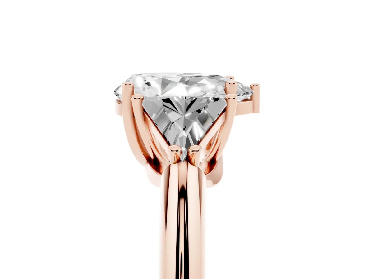 Three-Stone Pear Cut Diamond Engagement Ring with Trillion Side Stones and Prong Setting Rose gold