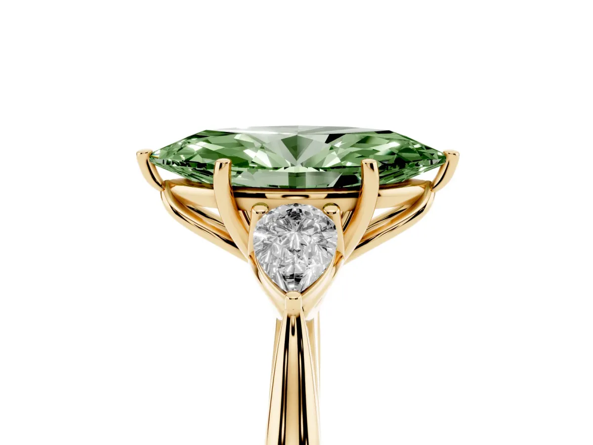Fancy Green Three-Stone Marquise Cut Brilliant Diamond Solitaire Ring with Tapered Band and Four-Prong Setting Yellow gold