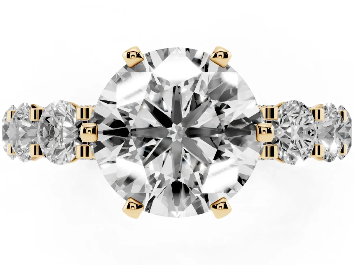Round Cut Diamond Side Stone Engagement Ring with Four-Prong Setting Yellow gold