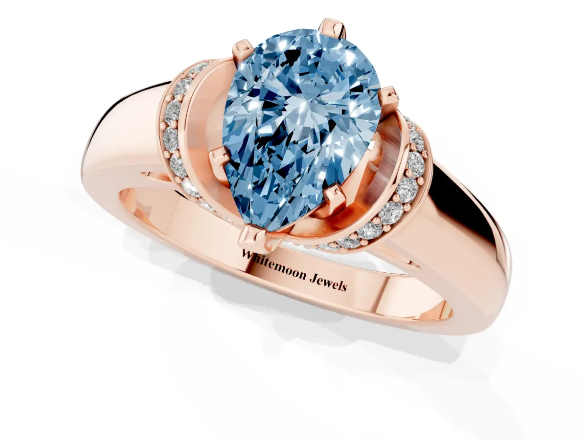 Fancy Blue Pear Cut Solitaire Diamond Ring with Pave Band and Six-Prong Setting Rose gold