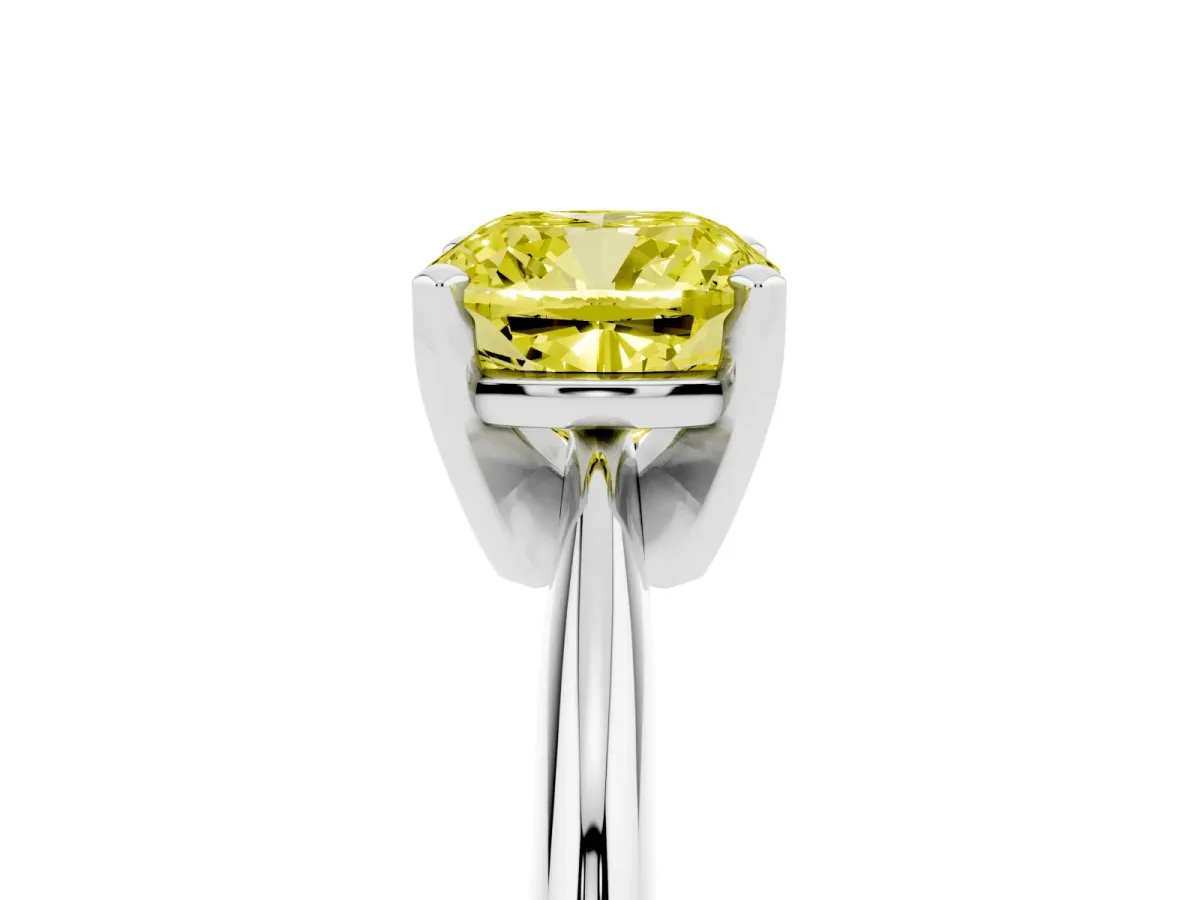 Fancy Yellow Cushion Cut Cut Solitaire Ring with Four-Prong Setting on a Classic Band Silver