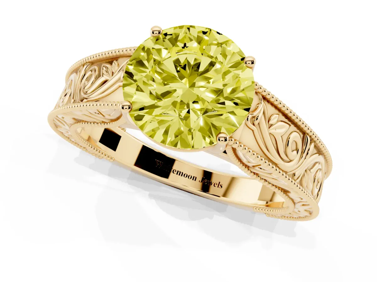 Fancy Yellow Round Cut Diamond Solitaire Ring with Engraved Band and Four-Prong Setting Yellow gold