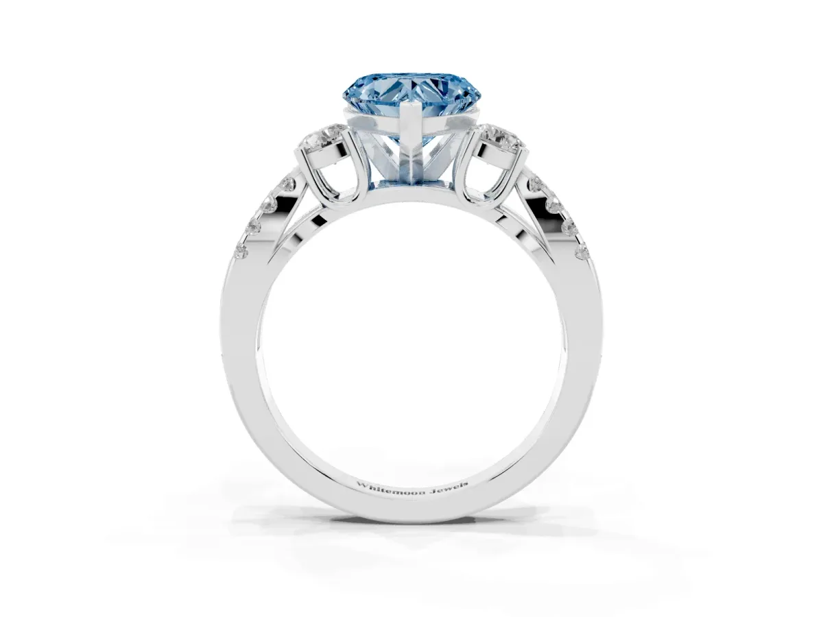 Fancy Blue Heart Cut Diamond Three-Stone Ring with Pavé Split Shank and Four-Prong Setting Silver