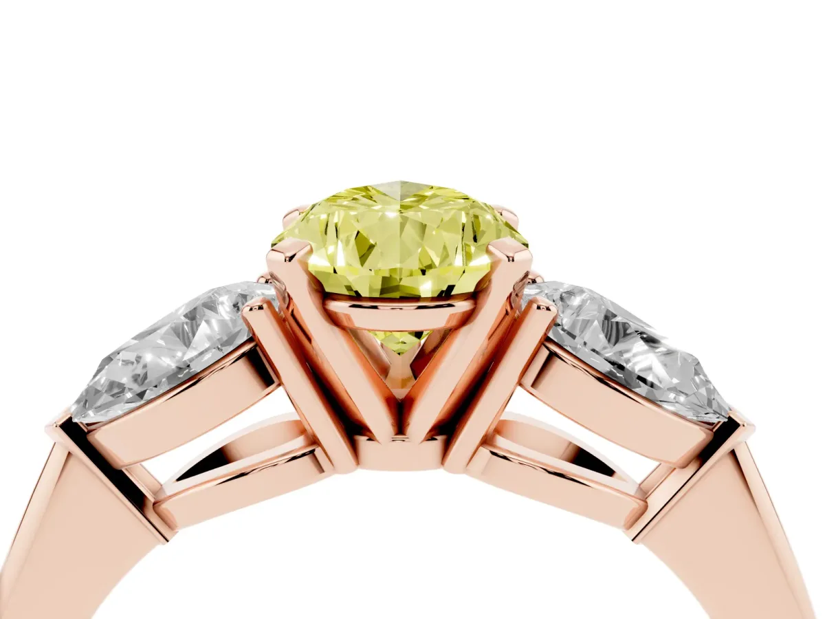 Fancy Yellow Three-Stone Pear Cut Diamond Ring with Pear Side Stones and Four-Prong Setting Rose gold