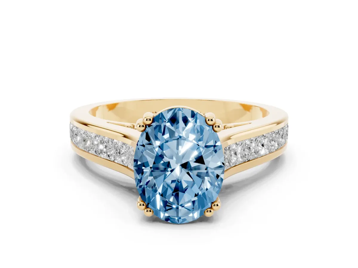 Fancy Blue Oval Cut Cut Channel Set Solitaire Engagement Ring with Prong Setting Yellow gold