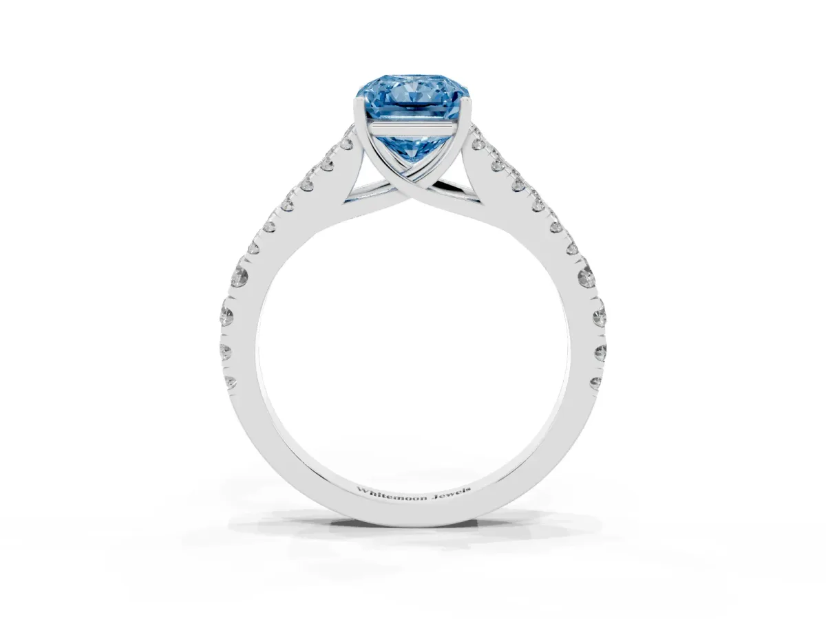 Fancy Blue Radiant Cut Diamond Split Shank Pavé Engagement Ring with Four-Prong Setting White gold