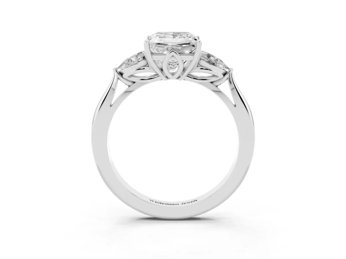 Princess Cut Diamond Three-Stone Ring with Pear Side Stones and Prong Setting Platinum