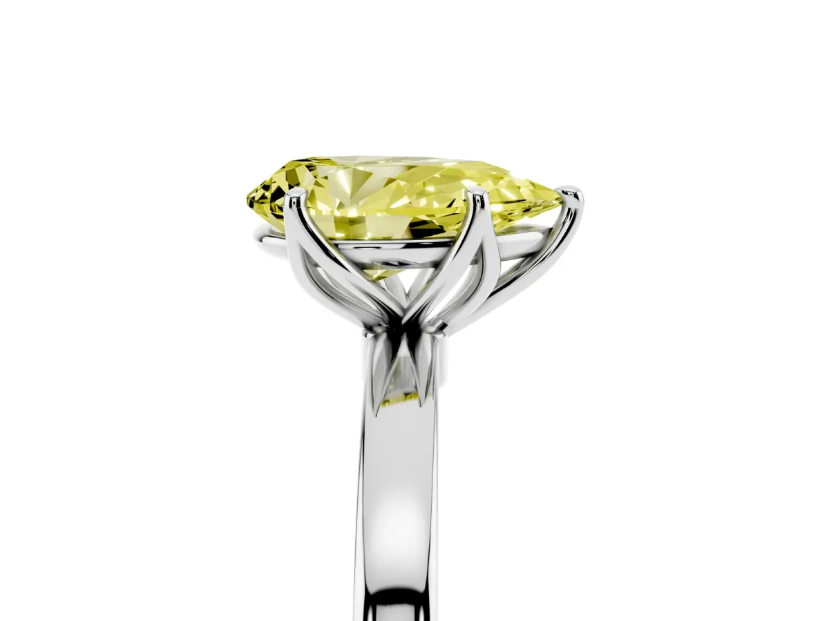 Fancy Yellow Pear Cut Diamond Solitaire Ring with Thin Band and Prong Setting Silver