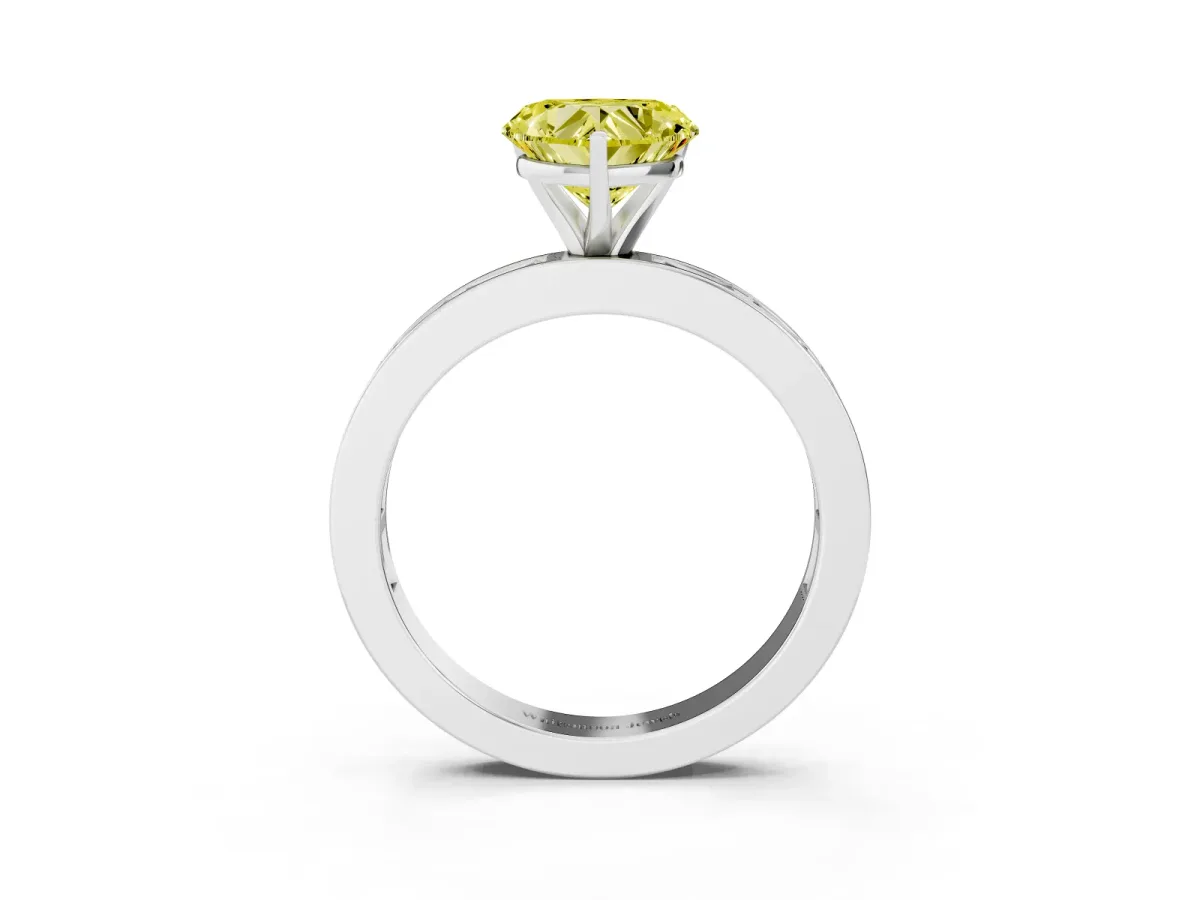Fancy Yellow Heart Cut Solitaire Diamond Ring with Channel-Set Baguette Band and Four-Prong Setting Silver