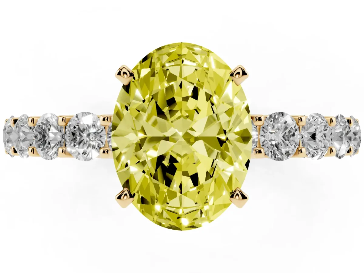 Fancy Yellow Oval Cut Diamond Solitaire Ring with Shared Prong Pavé Band and Four-Prong Setting Yellow gold
