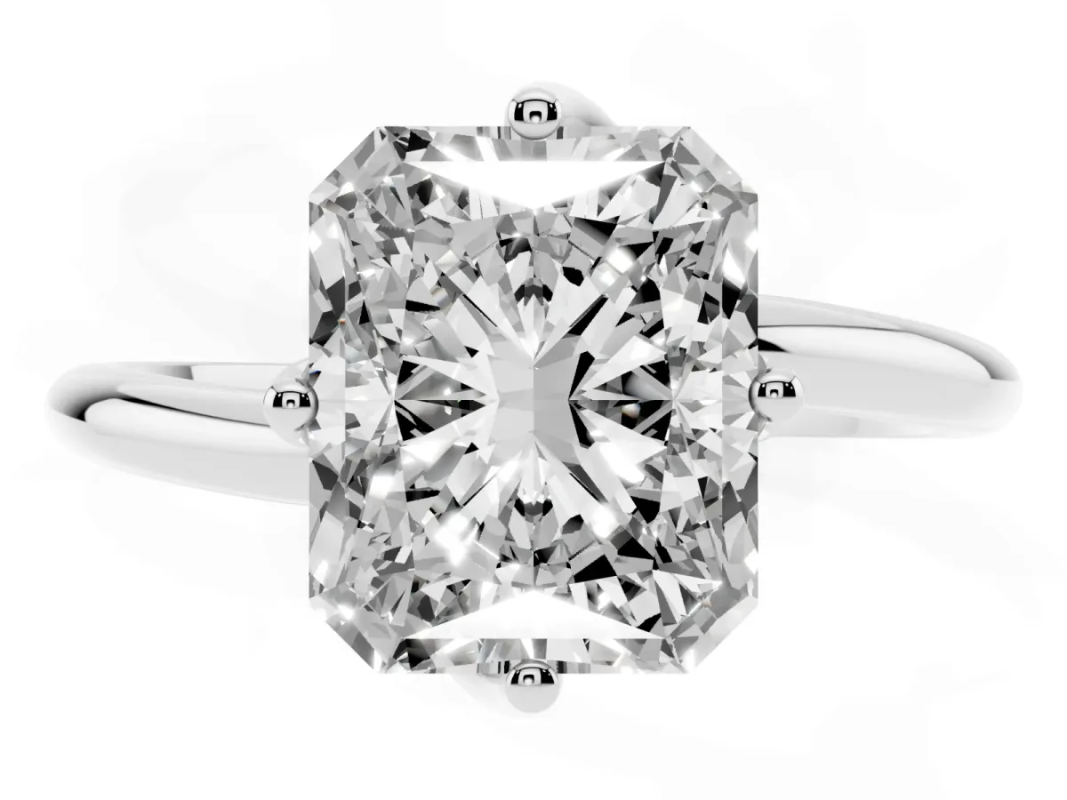 Radiant Cut Diamond Solitaire Engagement Ring with Four-Prong Setting and Classic Band Silver