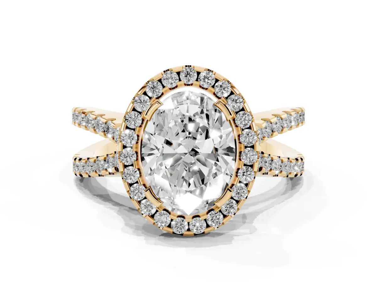 Oval Cut Diamond Halo Ring with Split Shank Pavé Band and Prong Setting Yellow gold