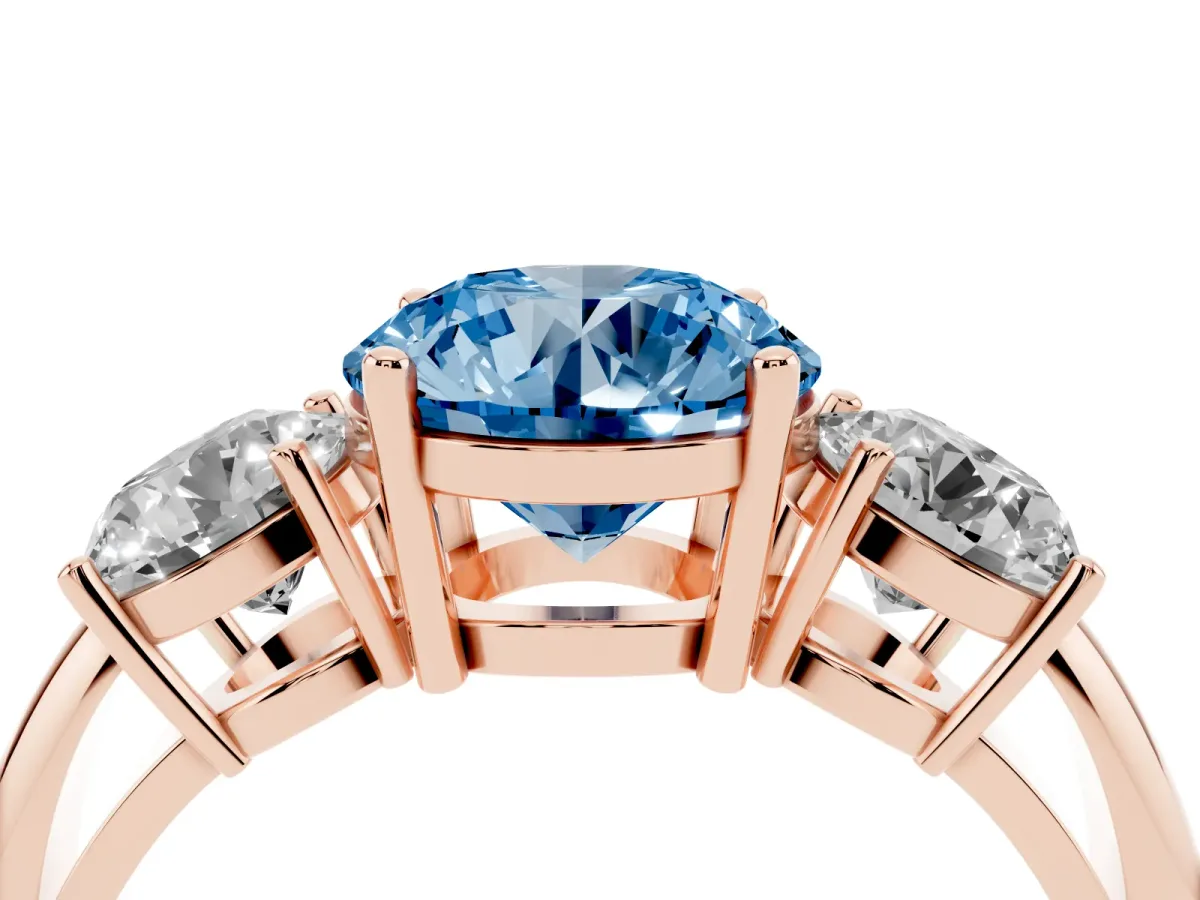 Fancy Blue Three-Stone Round Cut Cut Diamond Engagement Ring with Prong Setting on a White Gold Band Rose gold