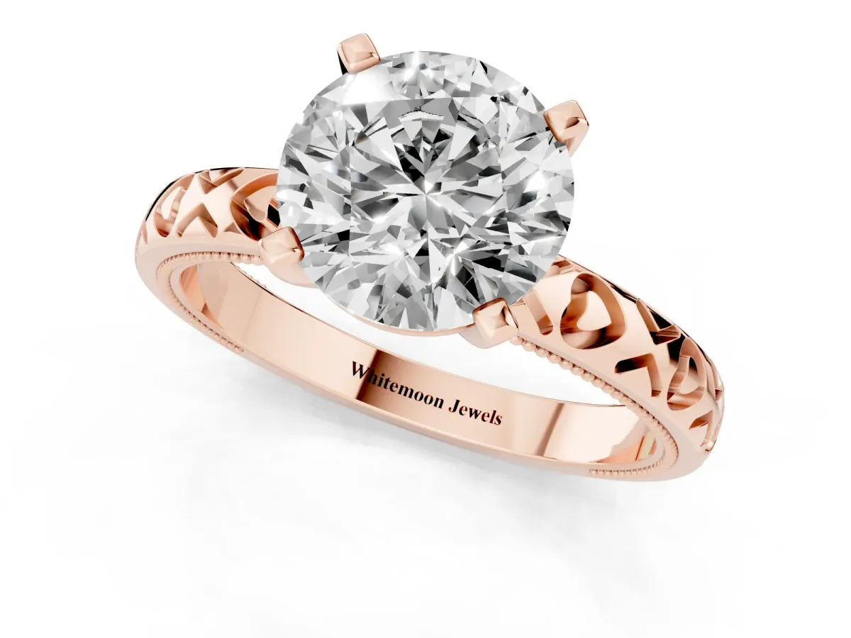 Round Cut Solitaire Diamond Engagement Ring with XO Engraved Band and Four-Prong Setting Rose gold