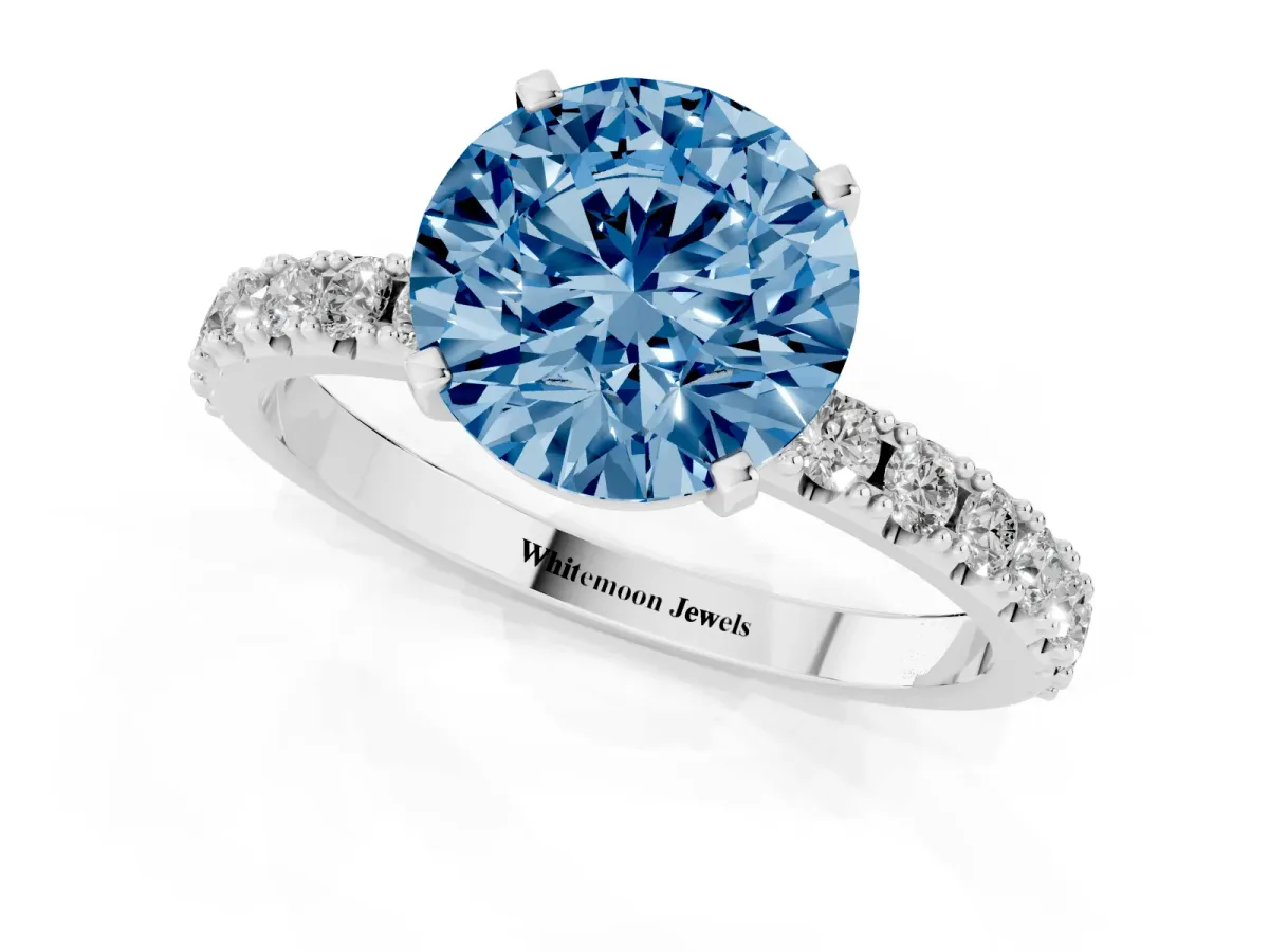 Fancy Blue Round Cut Diamond Solitaire Pavé Band with Four-Prong Setting Silver