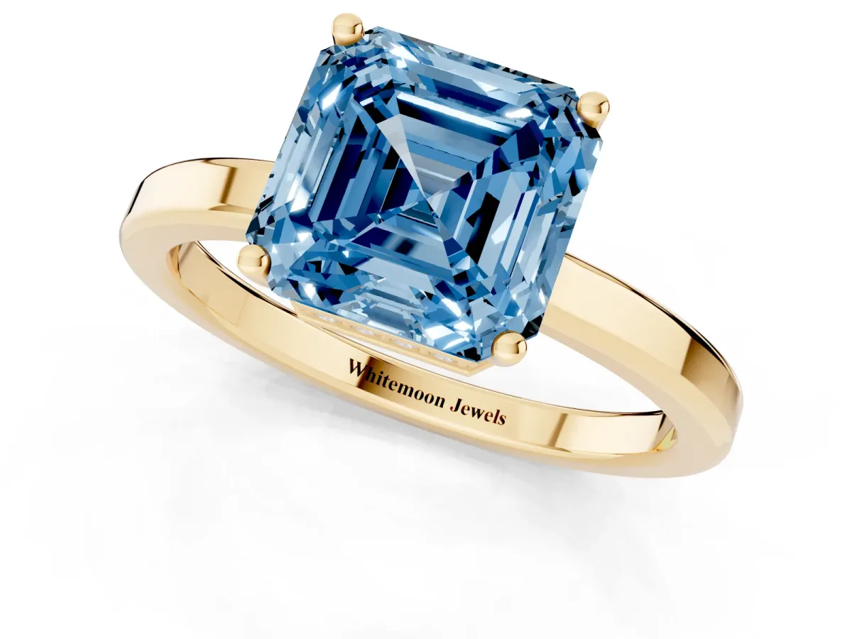 Fancy Blue Asscher Cut Cut Solitaire Engagement Ring with Four-Prong Setting on a Classic Band Yellow gold