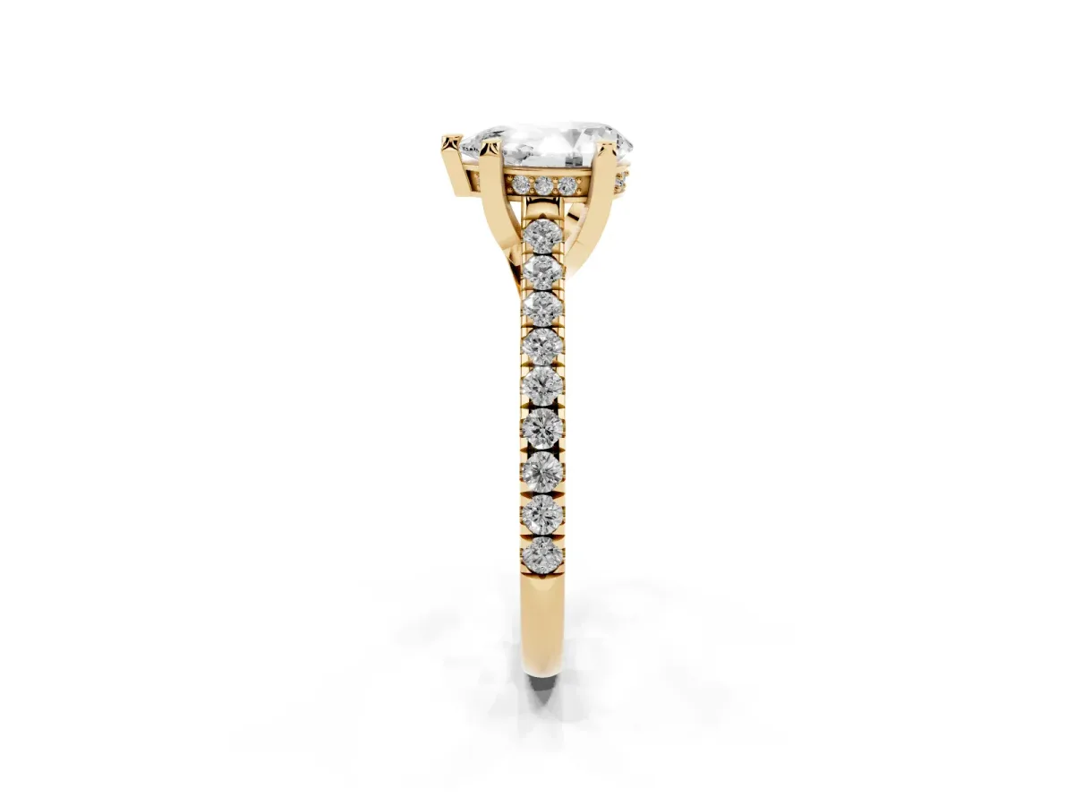 Pear Cut Brilliant Diamond Solitaire with Pavé Band and Four-Prong Setting Yellow gold