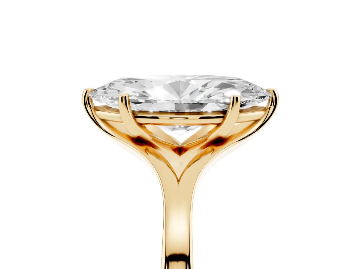 Marquise Cut Solitaire Diamond Ring with Six-Prong Setting and Tapered Band Yellow gold