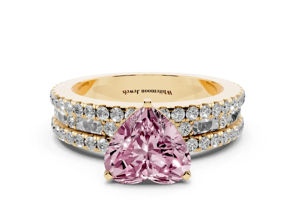 Fancy Pink Heart Cut Diamond Solitaire Ring with Pavé and Channel Set Band Yellow gold
