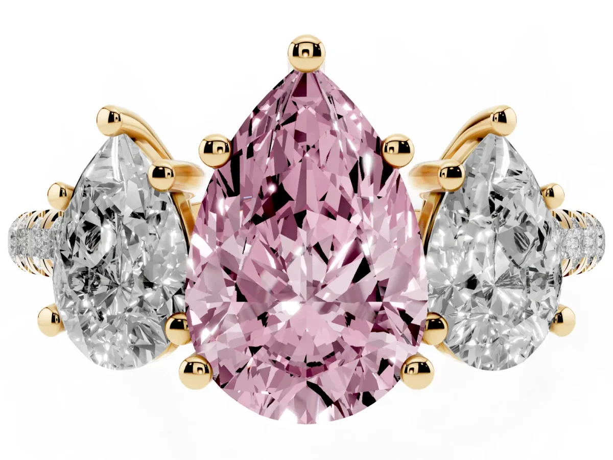 Fancy Pink Three-Stone Pear Cut Diamond Ring with Round Pavé Band and Prong Setting Yellow gold