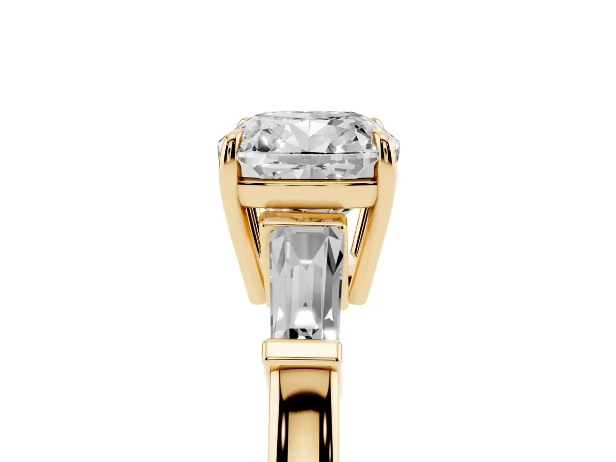 Cushion Cut Diamond Three-Stone Ring with Tapered Baguette Side Stones and Prong Setting Yellow gold
