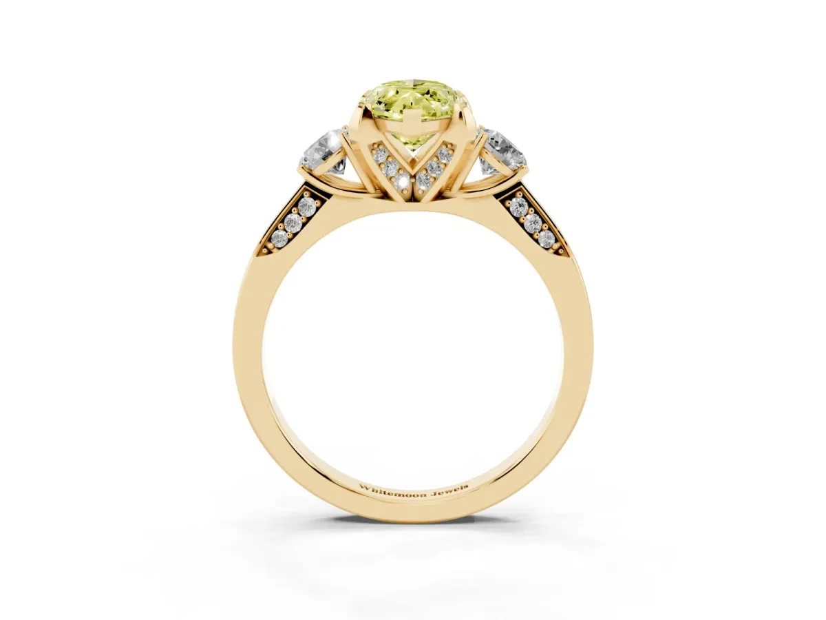 Fancy Yellow Marquise Cut Brilliant Three-Stone Diamond Ring with Pavé Band and Four-Prong Setting Yellow gold