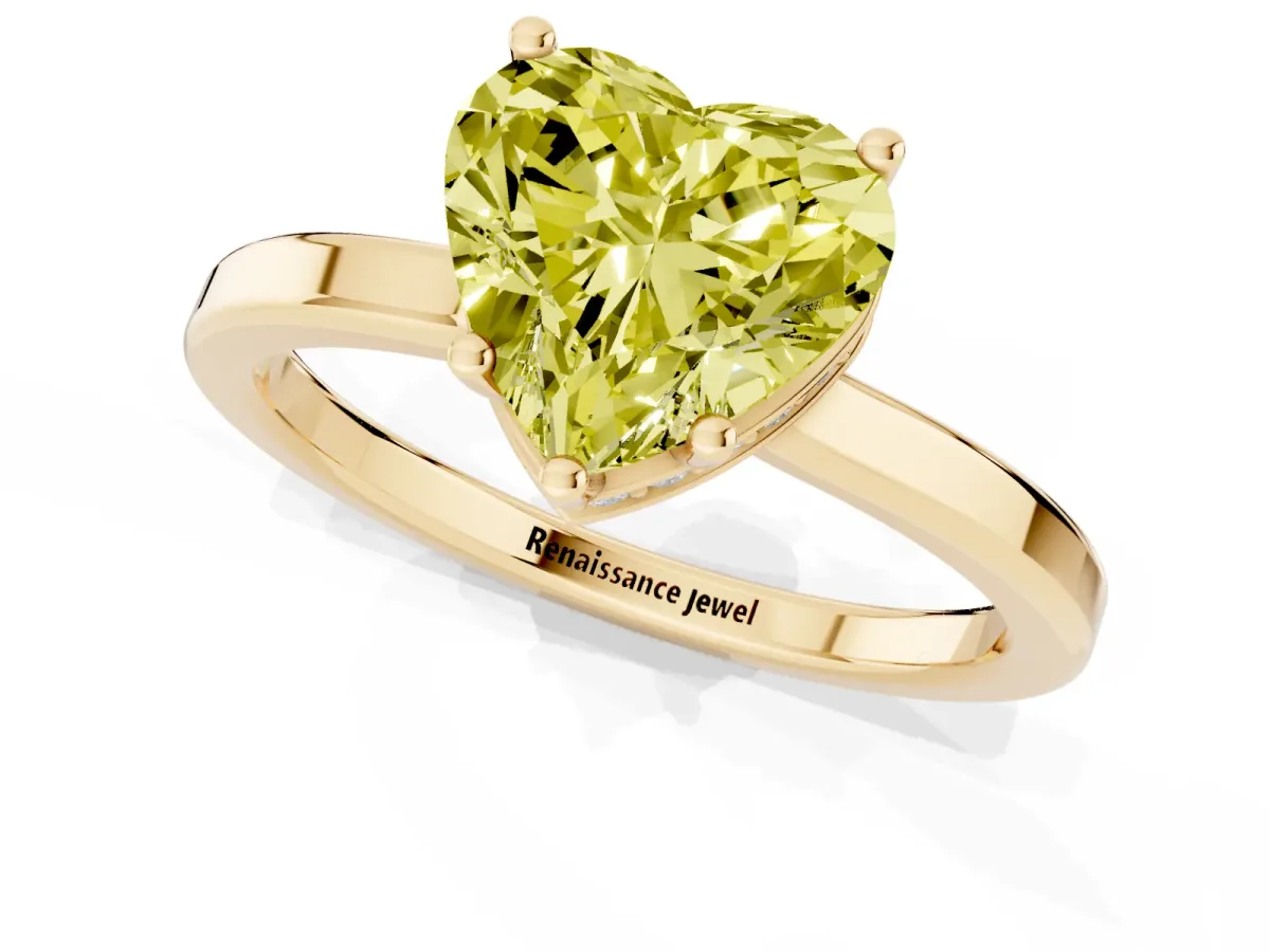 Fancy Yellow Heart Cut Cut Solitaire Engagement Ring with Four-Prong Setting on a Classic Band Yellow gold