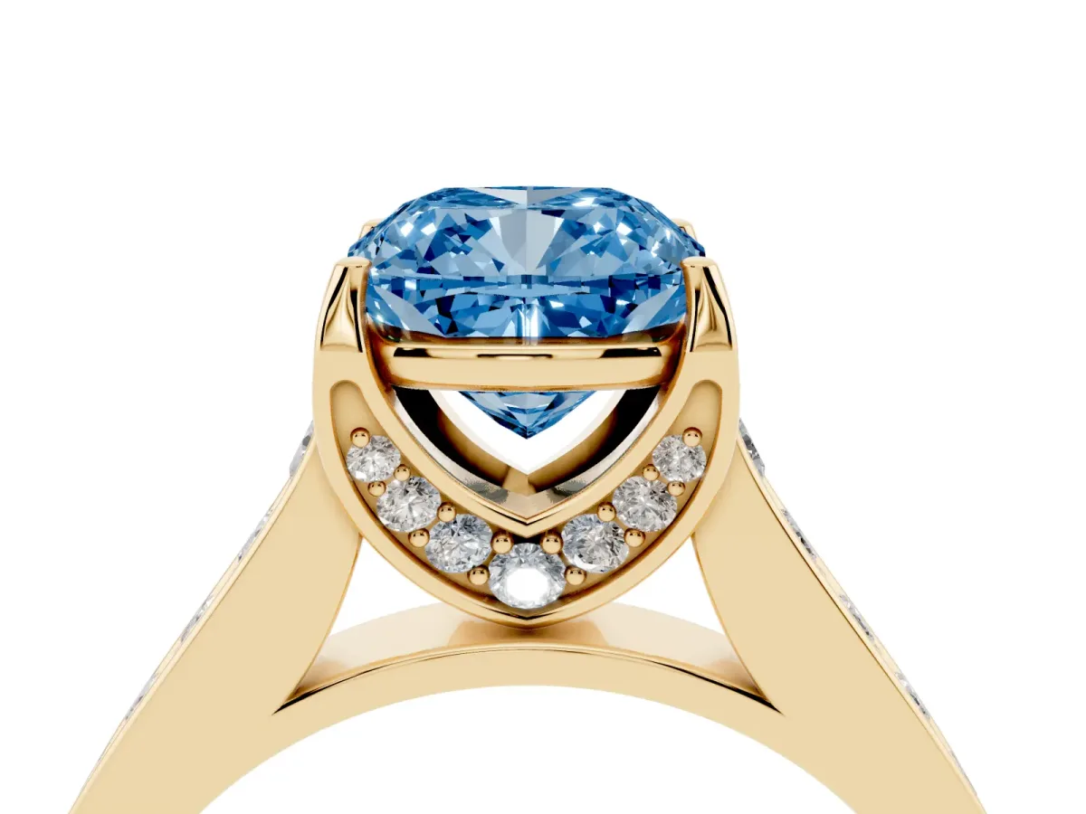 Fancy Blue Cushion Cut Brilliant Cut Diamond Engagement Ring with Pavé Band and Four-Prong Setting Yellow gold