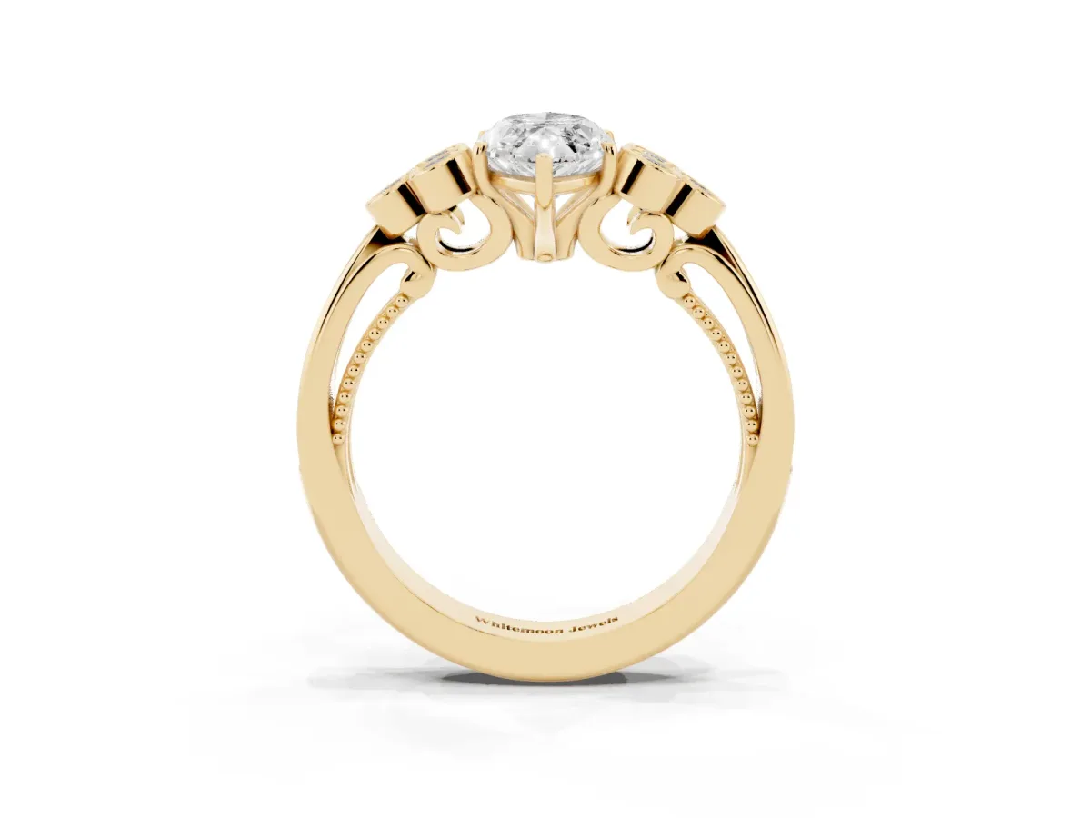 Marquise Cut Cut Diamond Engagement Ring with Bezel Set Round Side Stones and Prong Setting Yellow gold
